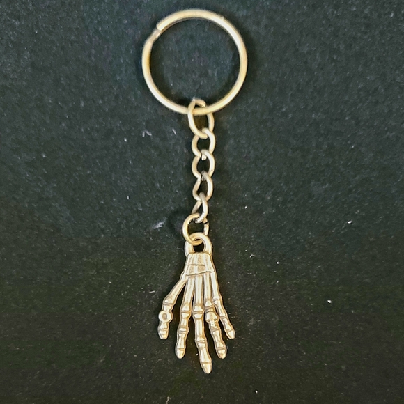 Brass Alloy Skeleton Hand With Skelton Ring Key Chain - Picture 1 of 4